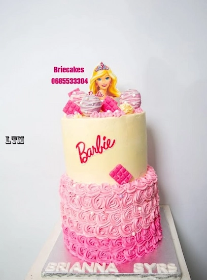 Two-tier pink Barbie birthday cake by Brie Cakes